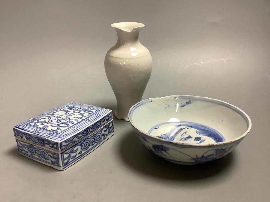 A 17th century Chinese blue and white bowl, 13cm diameter, a 19th century lidded box and a small damaged vase with Kangxi mark